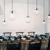 Suspension design en verre en forme de boule avec éclairage LED – finitions rose gold ou noir