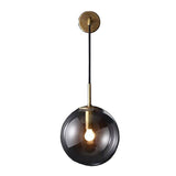 Applique murale avec boule en verre suspendue