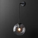 Applique murale avec boule en verre suspendue